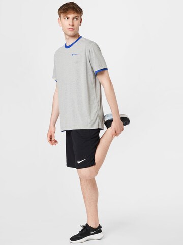 Champion Authentic Athletic Apparel Sportshirt in Blau