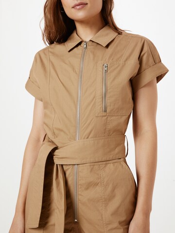 Tuta jumpsuit di Warehouse in beige