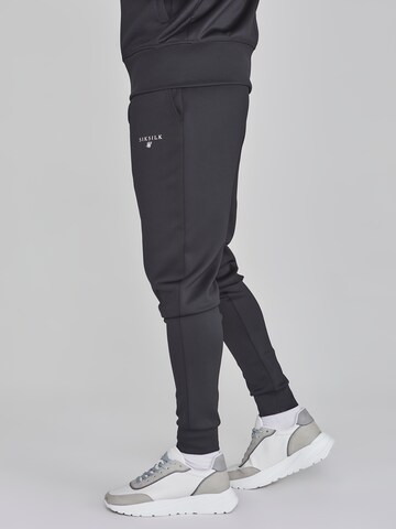 Effilé Pantalon SikSilk en noir