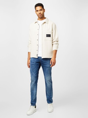 Calvin Klein Jeans Přechodná bunda – béžová