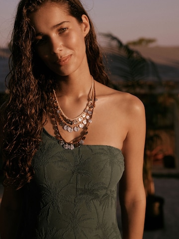 Costume intero di Next in verde