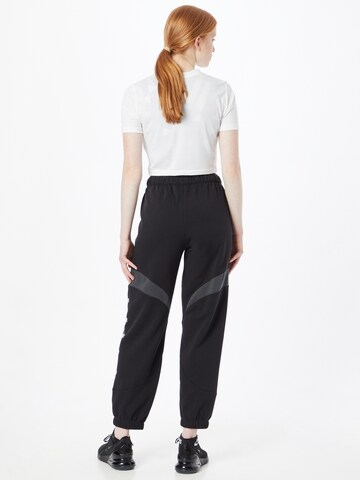 Nike Sportswear Tapered Pants in Black