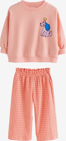 Next Setti värissä oranssi: etupuoli