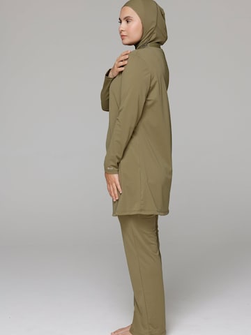 SIYA Swimwear High neck Badpak 'South - Covered' in Groen