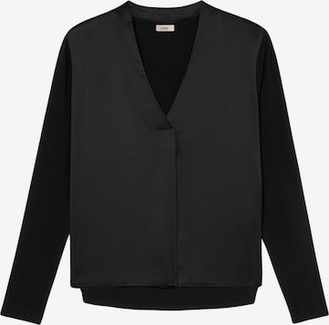 Top di oltre in nero: frontale