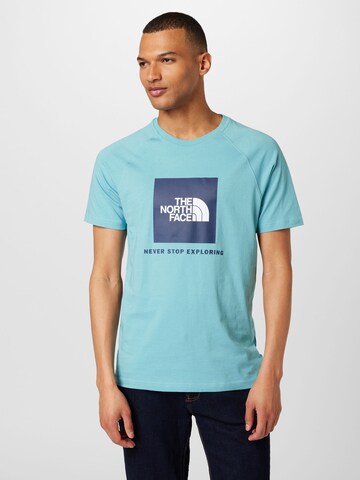 THE NORTH FACE Regularny krój Koszulka w kolorze niebieski: przód