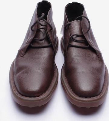 Tod's Flats & Loafers in 44 in Brown