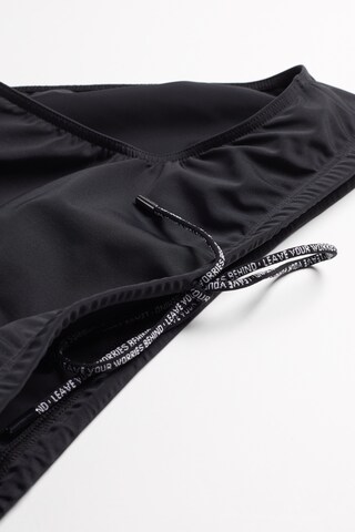 INTIMISSIMI Slip in Schwarz