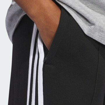 ADIDAS ORIGINALS Wide leg Trousers in Black