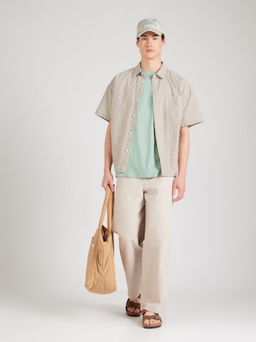 RIP CURL - Camiseta 'PACIFIC RINSE CIRCLE' en verde