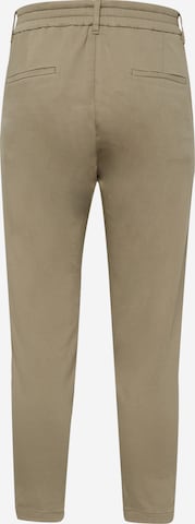 Tapered Pantaloni con pieghe 'CHASY' di DRYKORN in verde