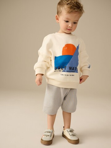 Next - Conjunto en beige: frente