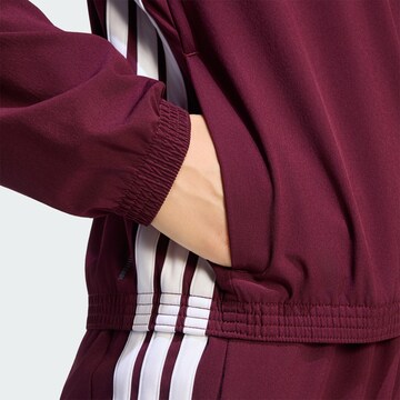 ADIDAS PERFORMANCE - Casaco de treino 'Train Essentials' em vermelho