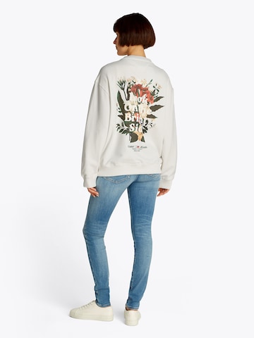 Tommy Jeans Суичър в бежово: отзад