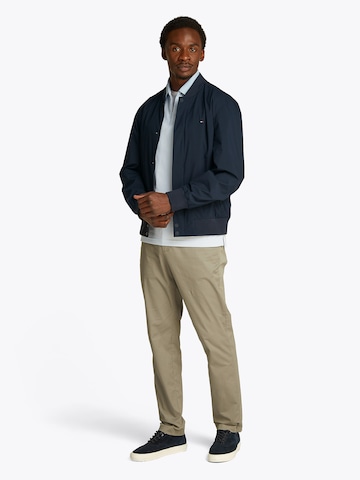 TOMMY HILFIGER Tussenjas in Blauw