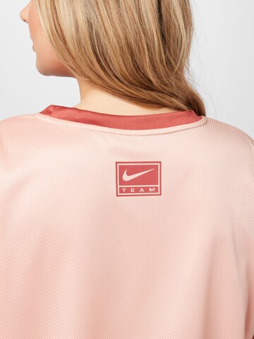 Nike Sportswear Performance shirt in Pink