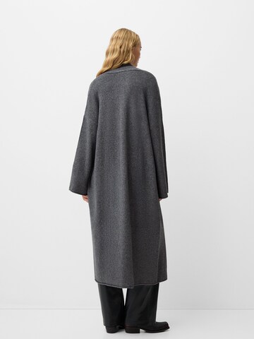Bershka Stickad kappa i grå