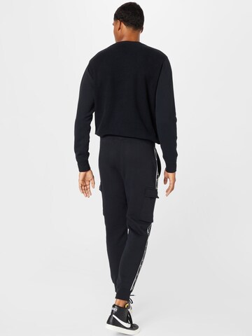 Nike Sportswear - Tapered Pantalón cargo en negro