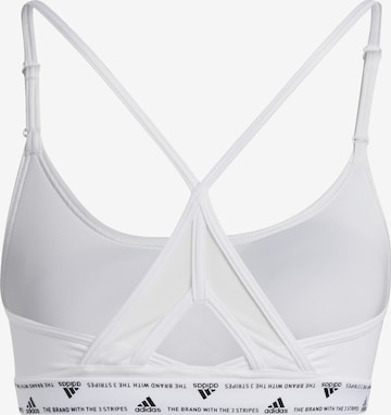 ADIDAS SPORTSWEAR - Soutien Bustier Soutien de desporto 'Aeroreact Light-Support 3-Stripes' em branco