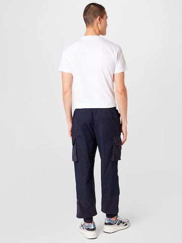 Mennace Tapered Cargo Pants in Blue