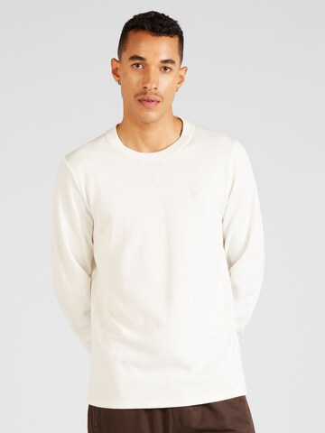 T-Shirt HOLLISTER en beige : devant