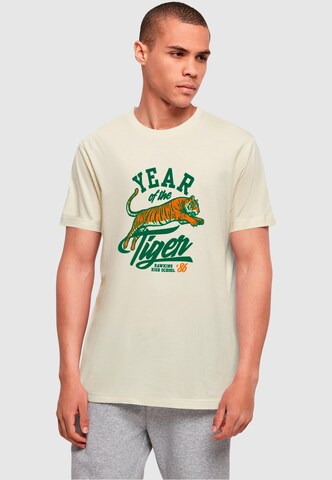 ABSOLUTE CULT T-Shirt 'Stranger Things - Hawkins Year of The Tiger 86' in Beige: Vorderseite