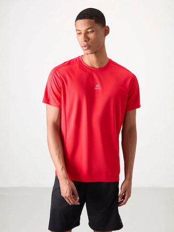 T-Shirt fonctionnel Tommy Life en rouge