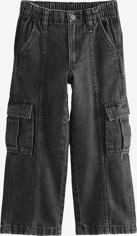 Jean Next en gris : devant