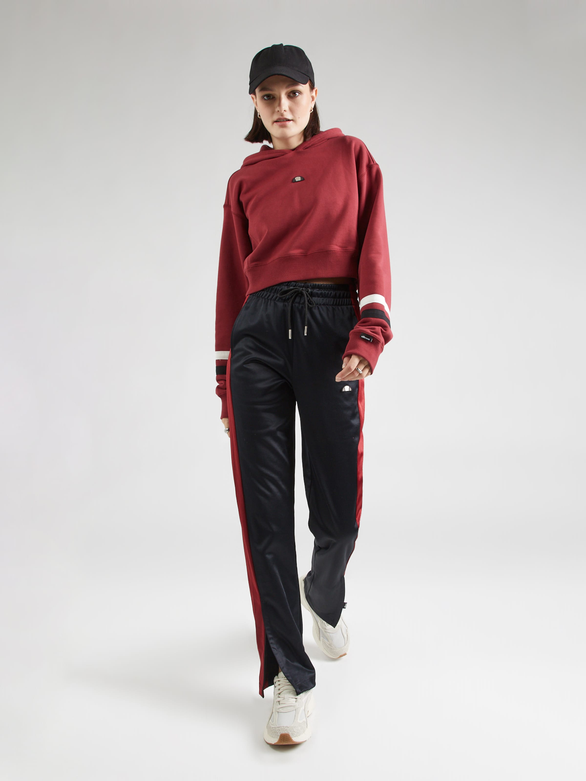 ELLESSE Regular Pants in Black ABOUT YOU