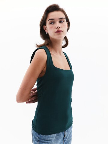 Haut OXXO en vert