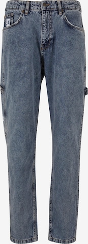 Karl Kani Flared Jeans in Blue: front