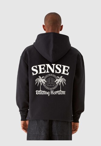 9N1M SENSE Sweatshirt 'Blazing Horizon Palm' in Schwarz: predná strana