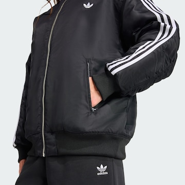 ADIDAS ORIGINALS Between-season jacket 'Firebird' in Black