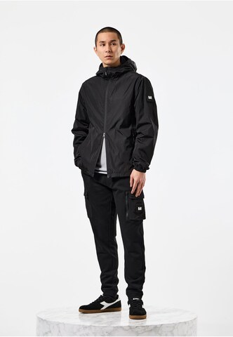 Weekend Offender Between-Season Jacket in Black