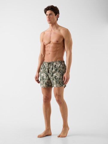 GUESS Badeshorts in Grün