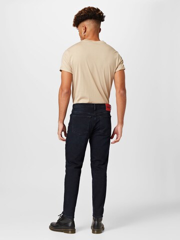 HUGO Tapered Jeans i blå