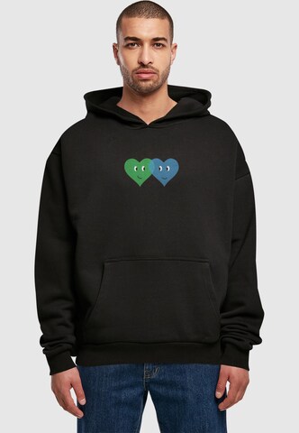 Merchcode Sweatshirt 'Hugs & Love - Two Hearts' in Zwart: voorkant