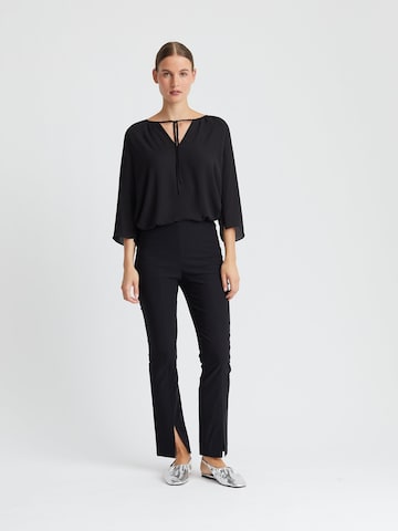 Minx Bluse‌‌ in Schwarz