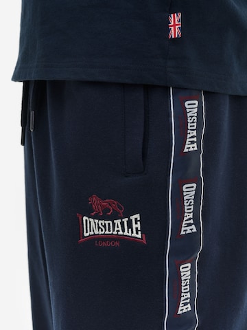 LONSDALE - Tapered Pantalón 'Delaval' en azul