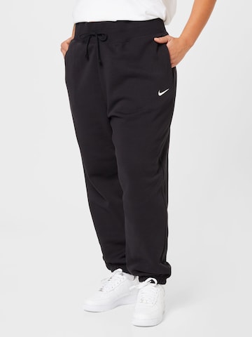 Nike Sportswear Tapered Παντελόνι φόρμας 'Phoenix' σε μαύρο: μπροστά
