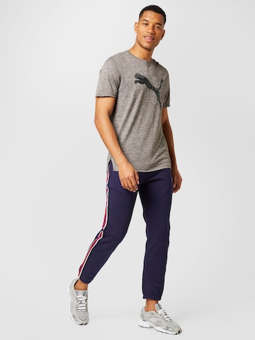 T-Shirt fonctionnel 'TRAIN FAV' PUMA en gris