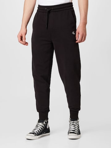 Calvin Klein Jeans Zwężane Spodnie w kolorze czarny: przód