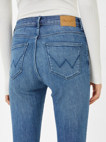 WRANGLER Скинни Джинсы в Синий