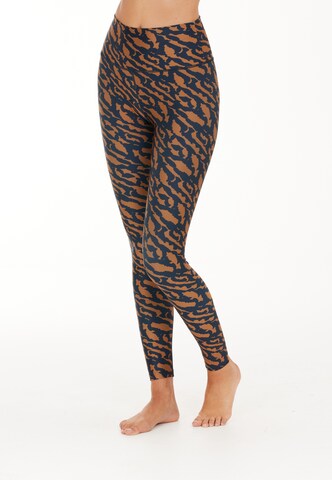 Athlecia Skinny Workout Pants 'Windia' in Brown: front