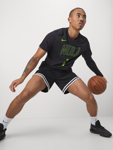 Loosefit Pantalon de sport Nike Sportswear en noir