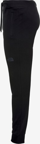 Effilé Pantalon THE NORTH FACE en noir