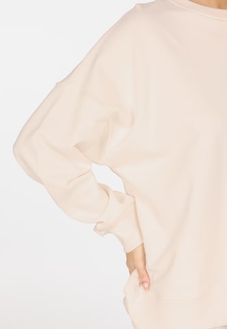 Athlecia Sports sweatshirt in Beige