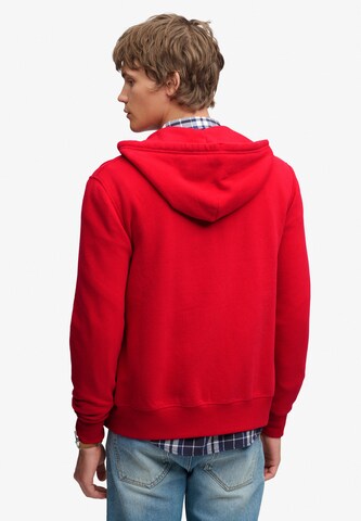 Veste de survêtement 'ESSENTIAL' Superdry & Co en rouge