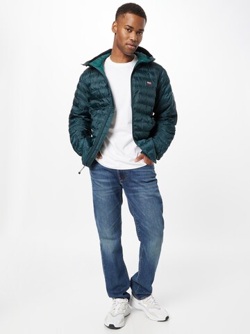 LEVI'S ® Övergångsjacka 'Presidio Pkbl Hooded Jkt' i grön
