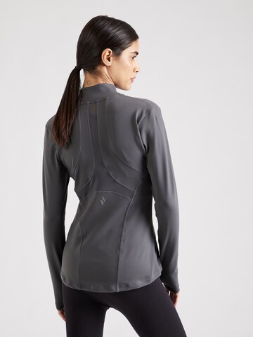 Veste de survêtement SKECHERS en gris